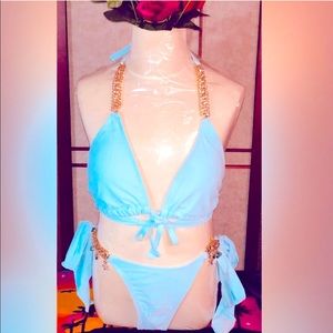 Bikini with chain and charm accents. New. Size L
